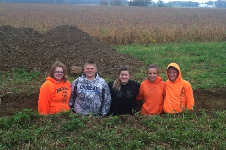 Analyzing soil profile in the pit